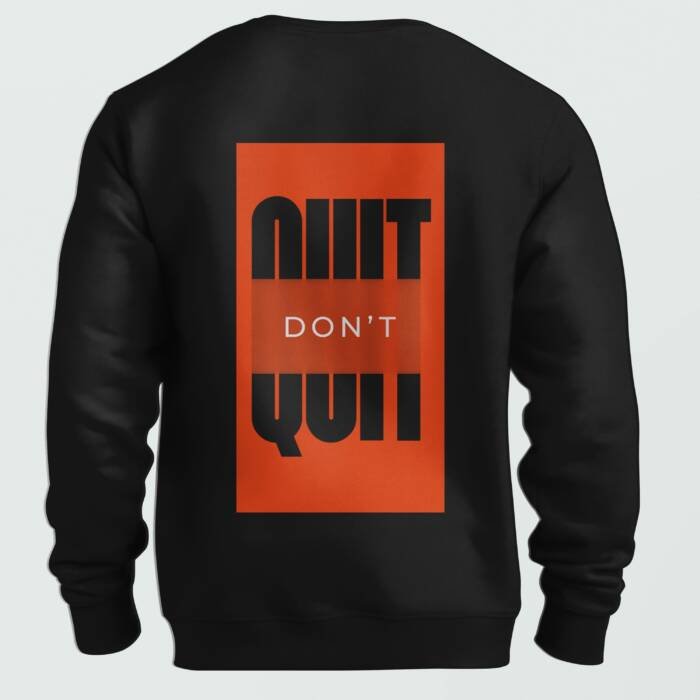 Black unisex sweatshirt with bold red-orange typography that says "Don't Quit" in an optical illusion design.