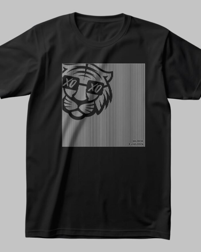 A black oversized t-shirt featuring a glitch-style tiger face with XO eyes, printed on a fine-line gradient background. A Kloch Exclusive streetwear essential.