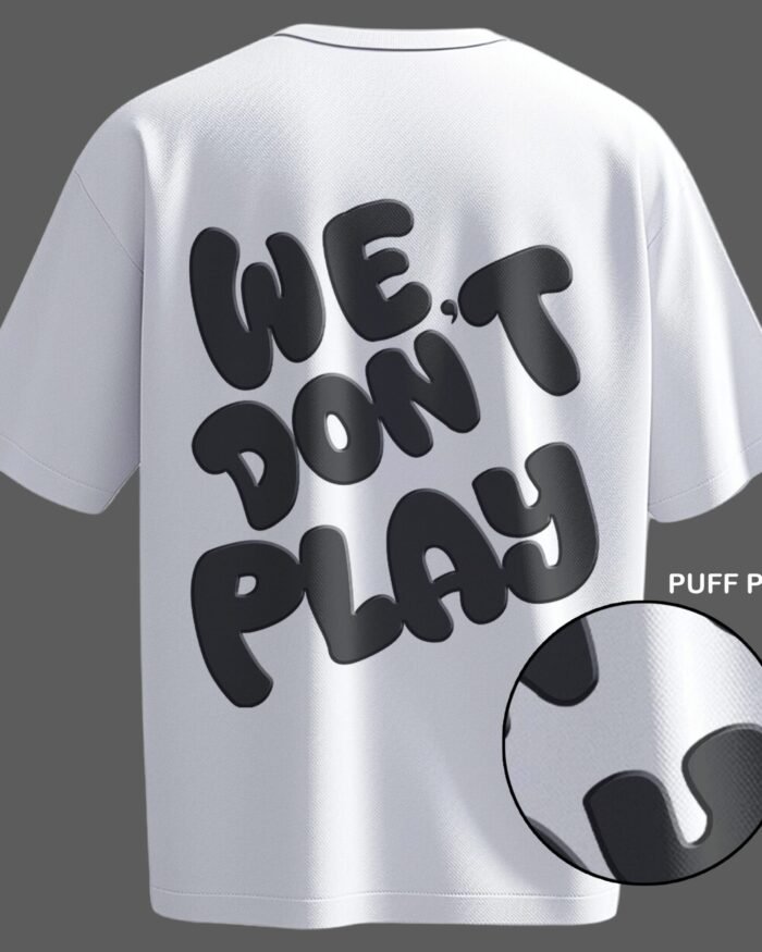 Oversized white streetwear t-shirt featuring 3D puff print "We Don’t Play" text – a bold and stylish must-have for urban fashion lovers.