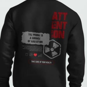 Black oversized sweatshirt with radiation warning graphic and health safety message – “The Phone is a Source of Radiation” design by Kloch