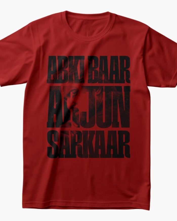 Red T-shirt with bold black text "Ab Ki Baar Arjun Sarkaar" featuring Nani's character from HIT 3 subtly visible behind the print.