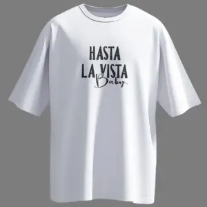 Front view of white oversized unisex t-shirt with "Hasta La Vista Baby" text printed in bold black typography