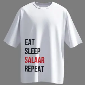 Black oversized t-shirt with bold white typography reading “EAT, SLEEP, SALAAR, REPEAT” – inspired by viral fanwear for Prabhas fans