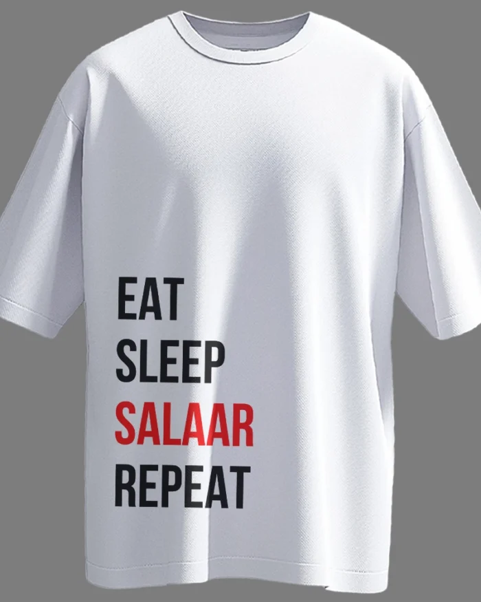 Black oversized t-shirt with bold white typography reading “EAT, SLEEP, SALAAR, REPEAT” – inspired by viral fanwear for Prabhas fans