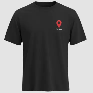 Black regular fit T-shirt with a red location pin icon and white “I’m Here” text printed in the center.