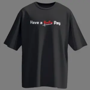 Black oversized unisex t-shirt with white and red “Have a Knife Day” print featuring a knife graphic – Kloch streetwear