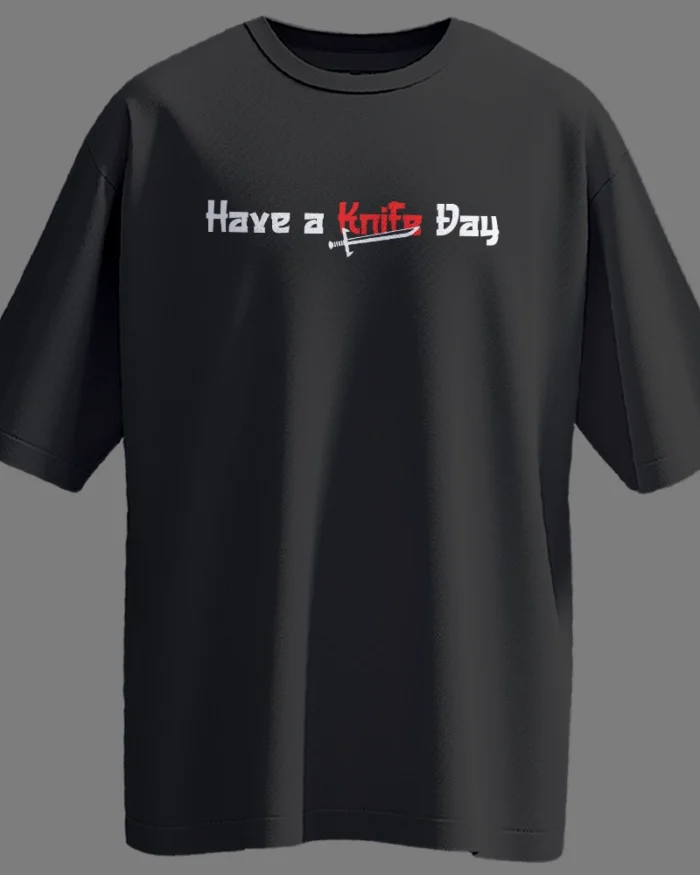 Black oversized unisex t-shirt with white and red “Have a Knife Day” print featuring a knife graphic – Kloch streetwear
