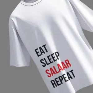 Black oversized t-shirt with bold white typography reading “EAT, SLEEP, SALAAR, REPEAT” – inspired by viral fanwear for Prabhas fans