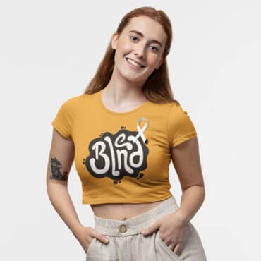 Woman wearing beige “Blend” crop top with white ribbon print – motivational cotton crop tee by Kloch