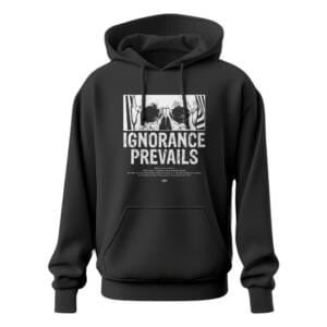 Black oversized hoodie with a white skull graphic and bold text "IGNORANCE PREVAILS" on the front.
