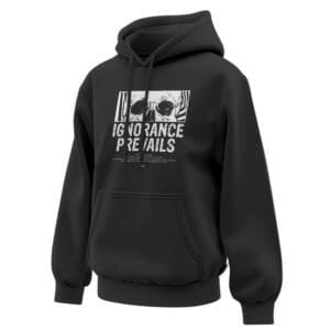 Black oversized hoodie with a white skull graphic and bold text "IGNORANCE PREVAILS" on the front.