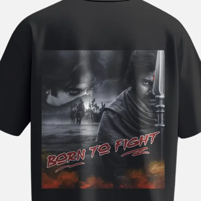Oversized black “Born To Fight – Rage of Veera” T-shirt with cinematic Pawan Kalyan print, available in 240 GSM and 180 GSM 100% cotton variants – Official Hari Hara Veera Mallu merch.