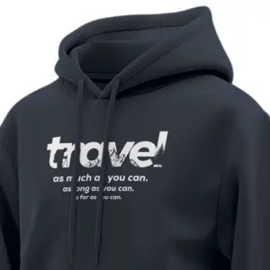 Blue unisex hoodie with a white travel-themed typography print reading ‘Travel as much as you can’.