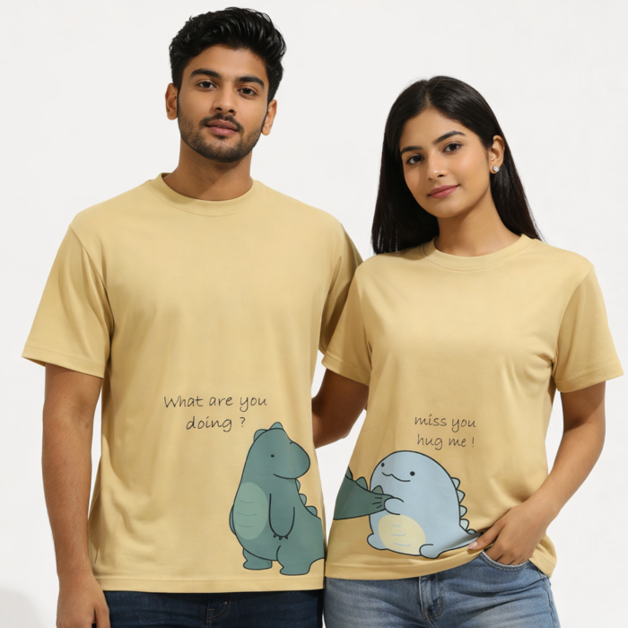 Beige couple t shirts with cute dinosaur hug graphic made from 180 GSM cotton by Kloch Exclusive for Valentines Day