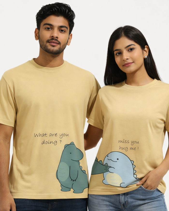 Beige couple t shirts with cute dinosaur hug graphic made from 180 GSM cotton by Kloch Exclusive for Valentines Day